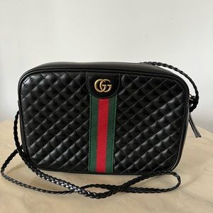 Gucci crossbody. There is enough room to fit all phone sizes including valuables